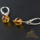 Faceted round amber earrings with silver